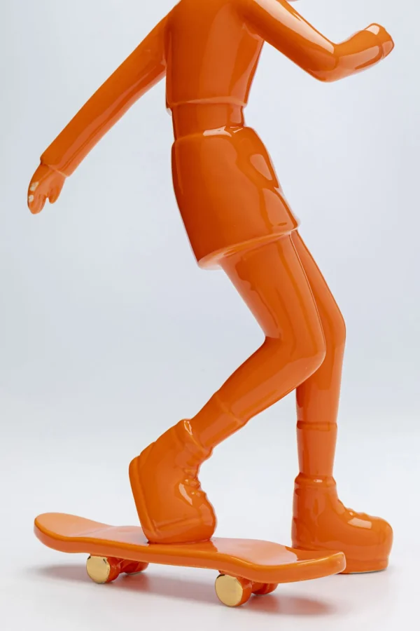 Figura decorativa Skating Astronaut arancione 33cm - KARE